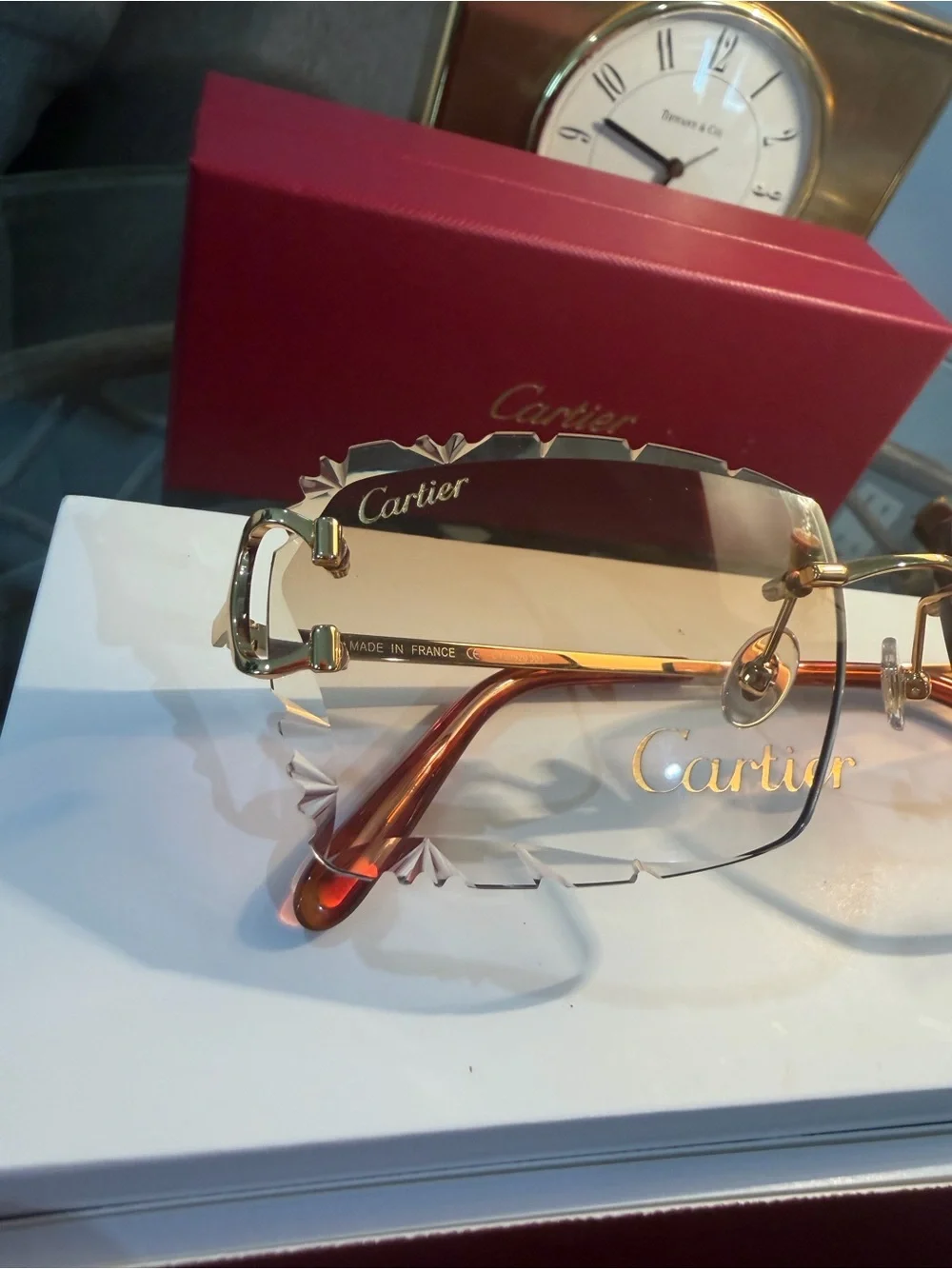 Cartier Men's Rimless Sunglasses with Purple Lenses and Gold Bridge
